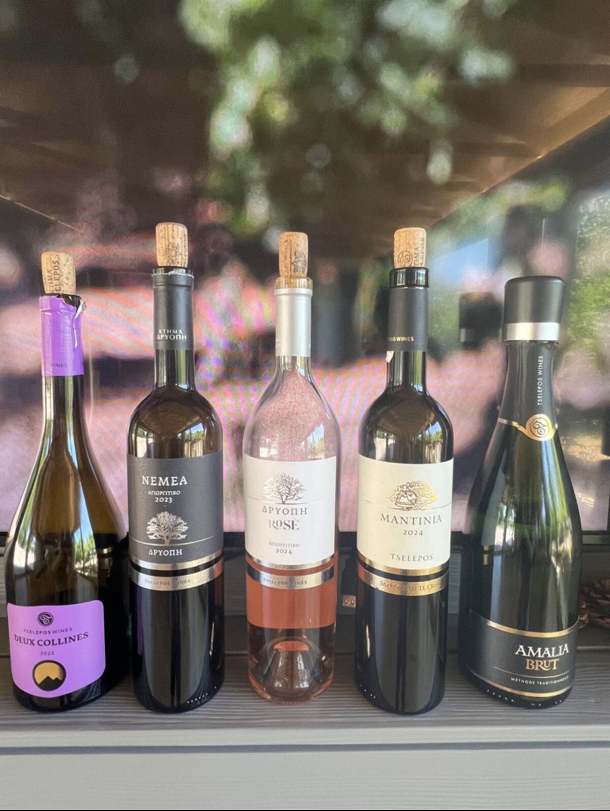 A lineup of Tselepos wines — Deux Collines, Nemea, Dryopi Rosé, Mantinia and Amalia Brut